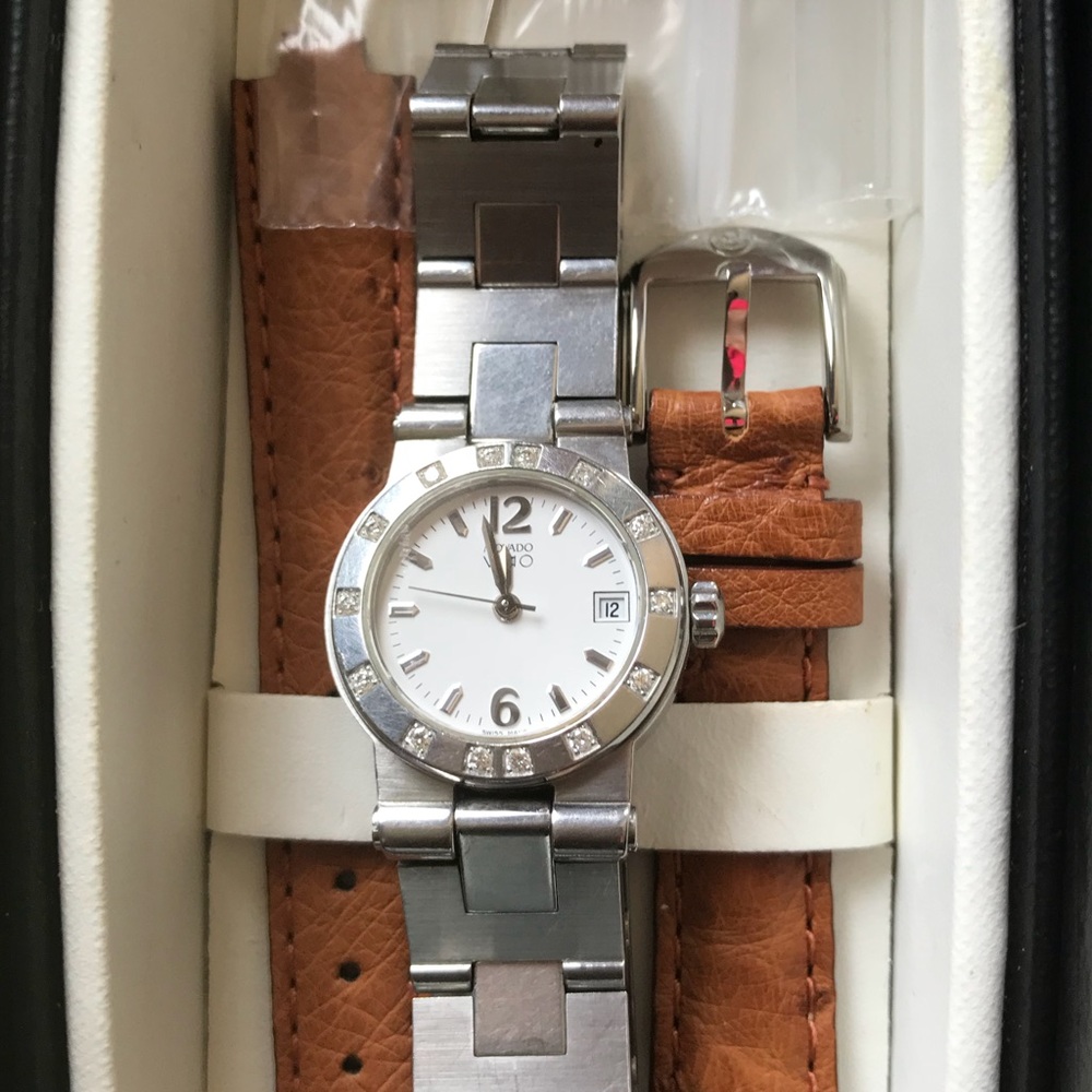 Movado women’s 14 sapphire stainless steel watch